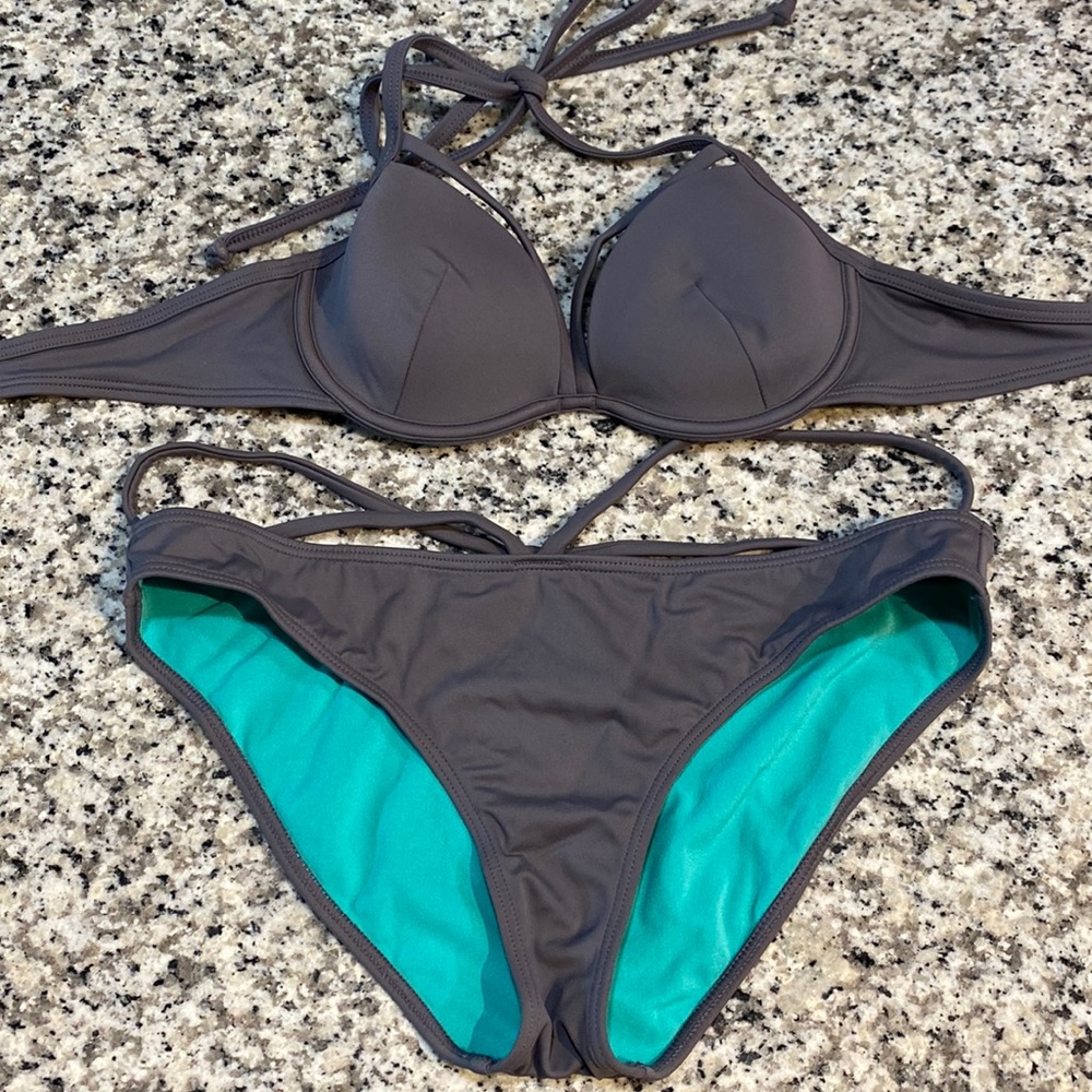 Never used! Swimsuit set. Bottom size medium. Top size 30B.
